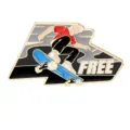 Detailed close-up of skateboarding metal enamel pin brooch, exquisite design for backpack decor. - Skateboarding