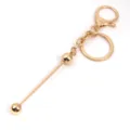 Llavero DIY de metal dorado con cierre de mosquetón y cadena para accesorios de moda. - Dorado