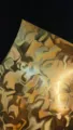 Golden metallic water ripple special paper detail shot, perfect for badge backing and crafts. - Gold