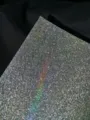 Holographic glitter badge backing paper detail, sparkling laser texture sheet for cards. - Crystal Lattice