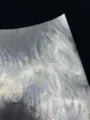 128g laser double flash special paper for badges, holographic cardstock detail texture view. - Feathers