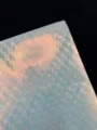 128g holographic specialty paper variant, showing iridescent glitter badge backing texture. - Phoenix Tail Pattern