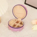Close-up detail of a round PU leather jewelry box with zipper and soft velvet inner compartments. - 10*10*5 / Mirror Pink
