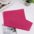 Hot pink wrapping tissue paper for gift boxes, shoes, and floral arrangements in detail view. - 17g Rose Red