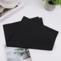 Black tissue paper for gift boxes, clothing packaging, and floral wrapping. Lightweight design. - 17g Black