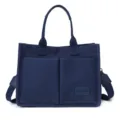 Blue canvas tote bag for women, casual commuter handbag with front pockets and shoulder strap. - L34 H25 T14 / Blue