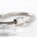 Silver snake chain charm bracelet with love letter bead detail, delicate fashion jewelry accessory. - Sister Style (G1039GO) / Gold