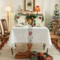 Christmas embroidered tablecloth with festive poinsettia pattern and elegant fringe tassels. - 140x140 / Embroidered Poinsettia with White Tassels