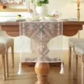 White lace table runner with elegant floral embroidery and tassels for dining room decor. - Lace Embroidered Geometric Flowers (Table Runner Only) / 35*350cm
