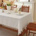 Mantel de mesa liso minimalista con flecos elegantes y diseño de rejilla calada. - 60x60cm / Cuadrícula pequeña color natural + borla