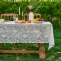 White lace tablecloth for outdoor French weddings, elegant floral fabric dining decor. - 140x100CM / Beige Paisley (Wavy Edges on 2 Sides)