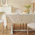 Cotton tablecloth with floral embroidery and tassels, perfect for dining table decor. - 140x260cm / Yellow Flowers on Apricot Background with Tassels (Not Waterproof)
