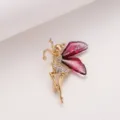 Elegant gold-plated fairy brooch with sparkling crystal rhinestones and translucent pink wings. - Red Fairy Dancer Brooch (C2152)