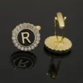 Gold-tone metal round letter R cufflinks with clear rhinestones and black enamel center. - B1396-R Cufflinks