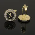 Gold tone rhinestone letter X cufflinks and collar pin set featuring elegant black enamel design. - B1396-X Cufflinks