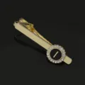 Gold-tone letter tie clip featuring sparkling rhinestone crystals and a chic black circular inlay. - T1051-I Tie Clip