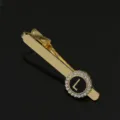 Gold-tone metal collar pin featuring a rhinestone round frame and letter L charm design. - T1051-L Tie Clip