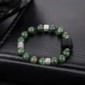 Bracelet de perles vertes avec charm lion et intercalaires argentés pour un style quotidien. - Bracelet Tendance National de Perles Vertes de Lion Chinois (S0043-A) / Vert