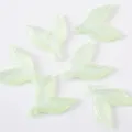 Detailed close-up of light green acrylic mermaid tail charms with glitter finish for DIY jewelry. - 50g Approx. 40 Pcs / Green