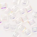 Close-up detail of 10mm square hollow crystal rhinestones with iridescent AB finish for DIY. - White AB Square (Single Piece)