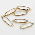 Gold-rimmed clear crystal oval double-loop connector for DIY jewelry making and bracelets. - 7x21mm / Clear White