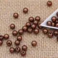 Brown double-hole ABS plastic imitation pearl loose beads for DIY jewelry making and crafts. - Coffee