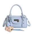 Light blue PU leather bowling handbag with cute puppy charm stylish crossbody bag - Blue