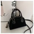 Vintage black leather bowling bag with contrast stitching and shoulder strap for women. - No Pendant / Black