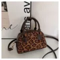 Vintage leopard print bowling handbag with brown leather trim and crossbody strap. - No Pendant / Leopard Coffee