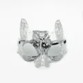 Silver metallic laser cut masquerade mask detail view with sparkling rhinestones and ornate patterns. - Cat / Silver