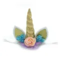Detailed close-up of gold unicorn horn headband with glitter ears and pastel flowers. - Gold