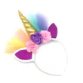 Close-up detail view of the sparkling unicorn horn, colorful tulle, and glitter ears. - Gold
