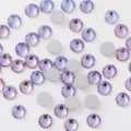Close-up detail of sparkling purple flatback rhinestones for nail art and DIY crafts. - ss16 (Approx. 4mm) Approx. 144pcs / Shifting Violet