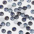 Detail shot of sparkling dark blue glass flatback rhinestones, perfect for DIY nail art and phone decor. - Purple Ghost