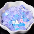 Lentejuelas de uñas de flores holográficas púrpuras iridiscentes para maquillaje DIY - Blanco AB