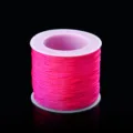 Cordón de nailon trenzado fucsia 72 en carrete para hacer joyas de bricolaje y nudos. - Rosa rojo