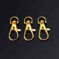 Mosquetones de metal dorado ganchos giratorios para llaveros y correas de bolsos - Mosquetón Perro 3g / Dorado
