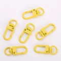 Yellow metal spring swivel keychain clips, U-shaped dog hooks for bags and crafts. - Yellow