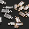 Colgantes de circonita rectangular, conectores metal plata y oro accesorios joyeria DIY. - Abalorios rectangulares de 3x6 mm con un solo asa