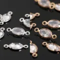 Conectores ovalados de circón de cristal para joyería DIY, acabados en plata y oro. - Abalorios ovales de 4x6 mm con doble asa