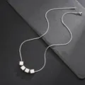 Minimalist titanium steel snake chain necklace with four cute cube pendants for daily wear. - Snake Chain / 55+5cm / Steel