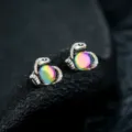 Close-up detail of snake-inspired rainbow stone ear clips, stylish and unique design. - Eye of Medusa Earrings (Multicolor) - Pair