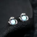 Detailed snake ear clips with iridescent gemstone, non-pierced magnetic fashion jewelry detail. - Eye of Medusa Earrings (Blue) - Pair