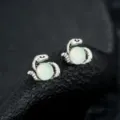 Elegant snake stud earrings with light green round beads for women and men daily wear. - Eye of Medusa Earrings (Light Green) - Pair
