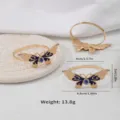 Goldene Schmetterling Serviettenringe mit blauer Emaillierung und Kristallen für Tischdeko. - Schmetterling Blau Stil (Z1215-BLU) / Blau