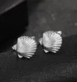 Elegant silver shell cufflinks for men, perfect for business and casual wear suits. - Pair of Cufflinks (B1475)