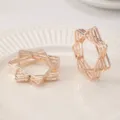 Portatovaglioli in metallo oro rosa con design a stella multistrato cavo geometrico per la tavola - Oro rosa