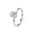 Close-up detail of the sparkling oval moissanite stone and polished silver band showcasing design. - Platinum 5x7mm Moissanite