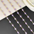 Detailed close-up of 4mm purple rhinestone chain, gold metal DIY accessories for crafts. - Purple KC Gold