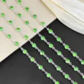 Detailed close-up of DIY 4mm green rhinestone silver cup chain for accessories decoration. - Green Silver